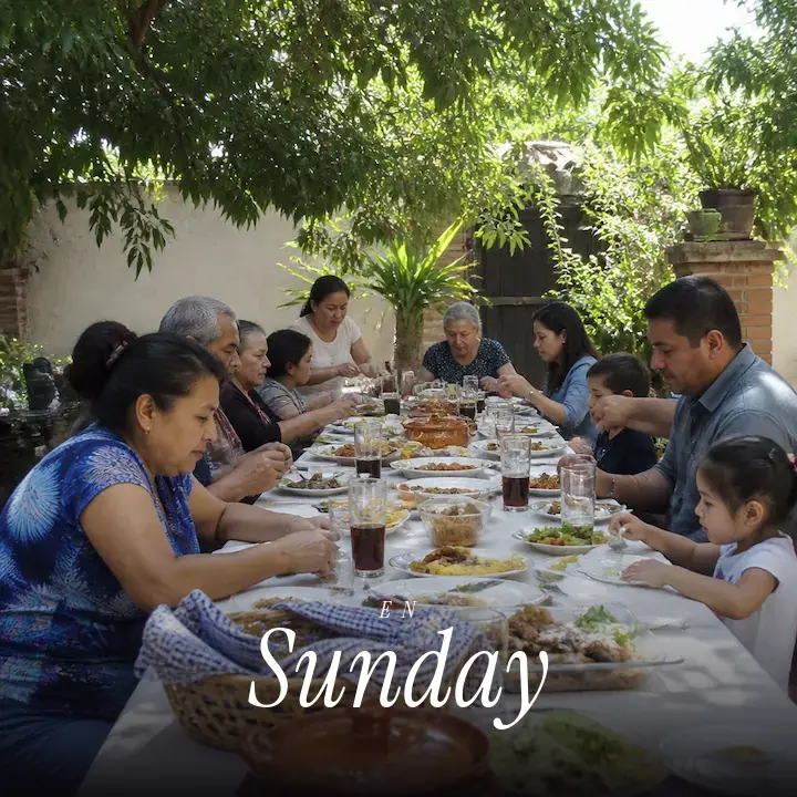 Three generations of a family at a long lunch table in a garden, with the English word Sunday printed across the bottom.